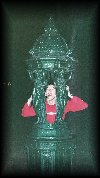 Mixaili drinking water from a fountain